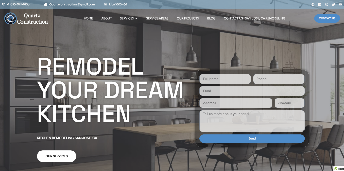 Quartz Construction website shown on a laptop